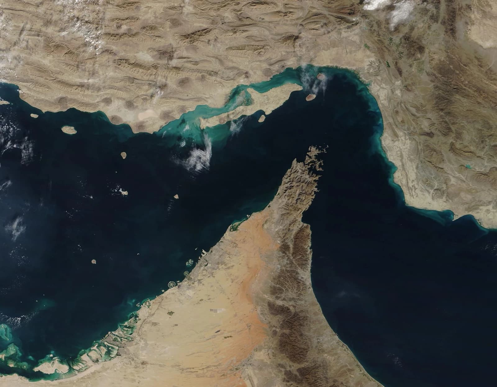 Satellite image showing the Strait of Hormuz between the Persian Gulf and the Gulf of Oman.