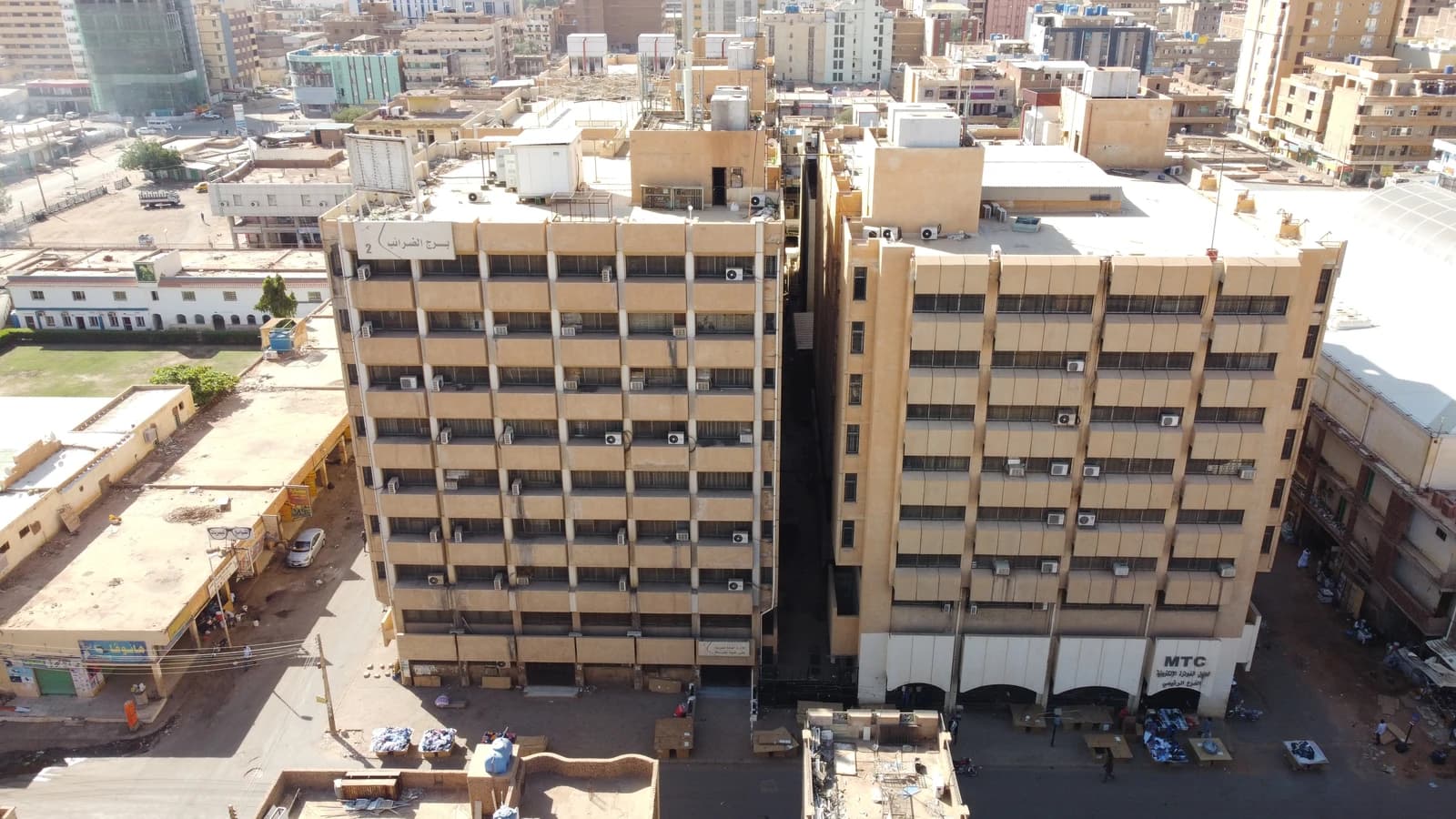 Aerial view of Bank of Khartoum Headquarters building in Khartoum, Sudan, with other buildings.