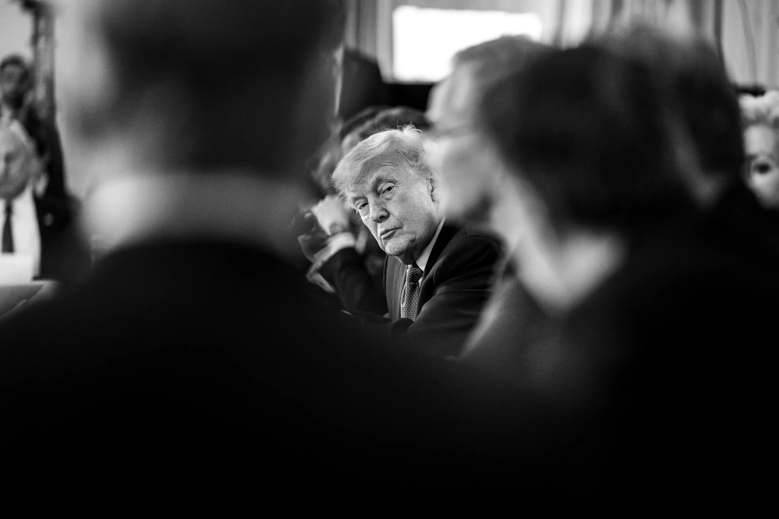 Donald Trump, former US President, attending a roundtable meeting.