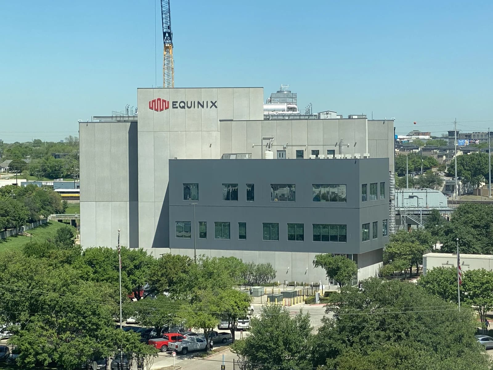 Equinix data center building exterior with company logo visible.