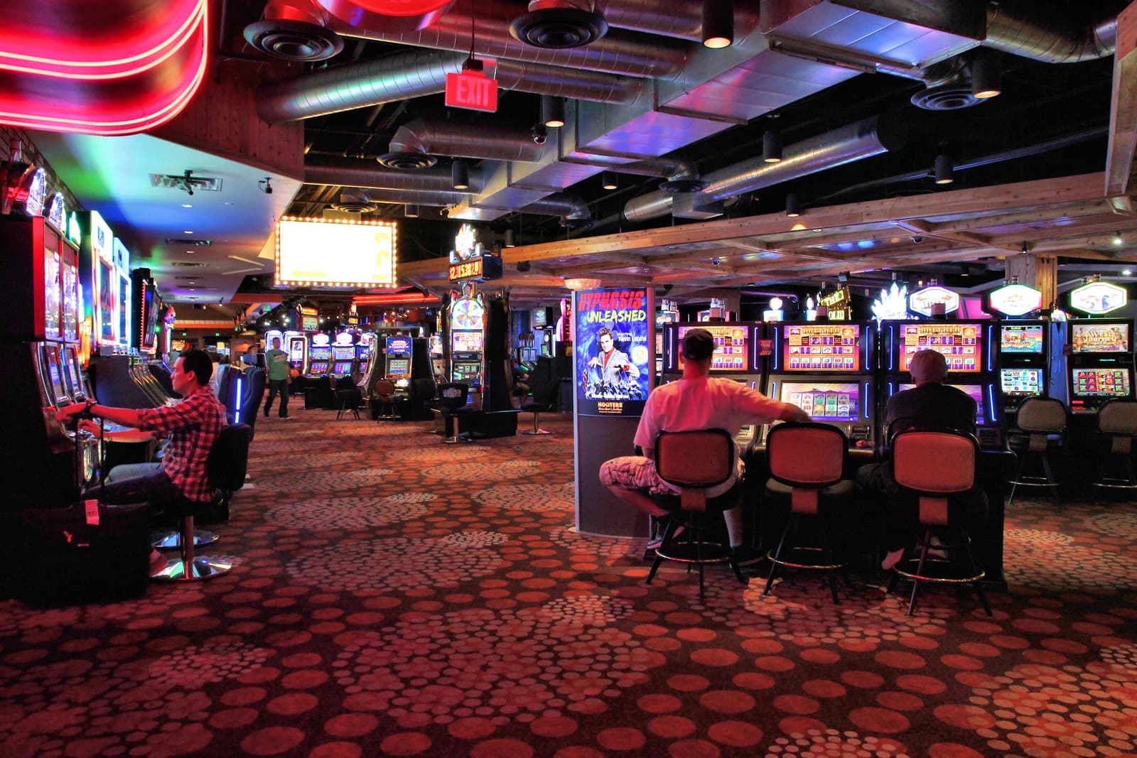 People gamble on slot machines inside the OYO Hotel and Casino in Las Vegas.