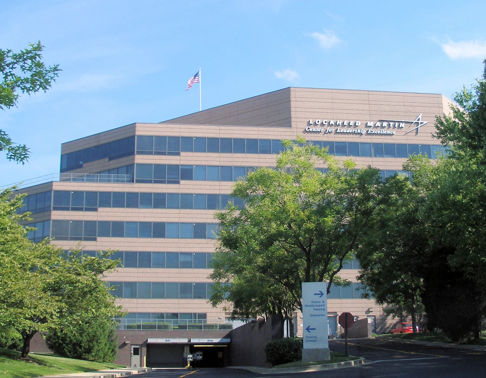 Lockheed Martin headquarters building with an American flag flying on the roof.