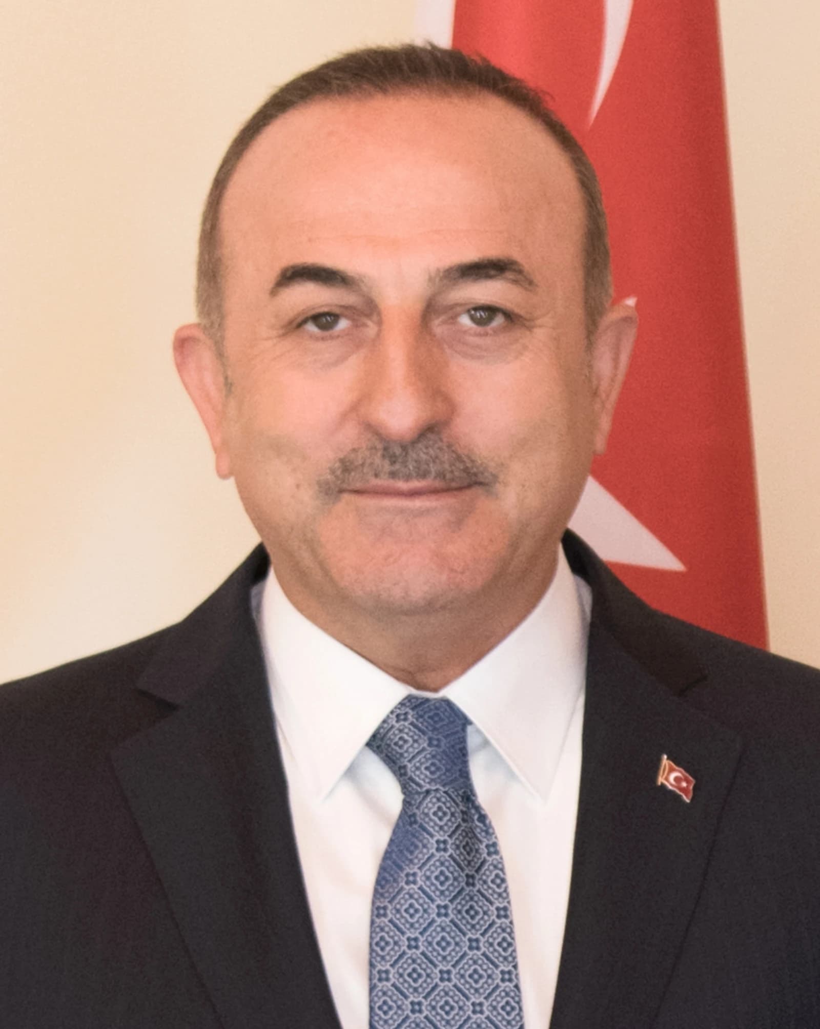 Mevlüt Çavuşoğlu, Turkish Minister of Foreign Affairs, looks at the camera.