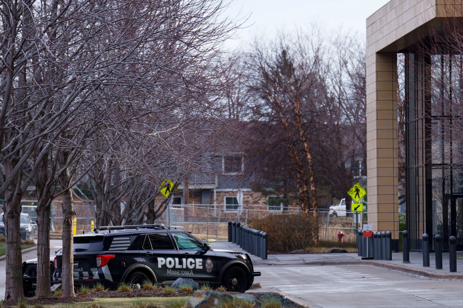 Minnetonka police vehicle parked outside the UnitedHealthcare Headquarters building.