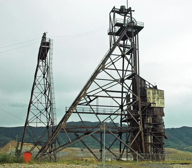 Large steel headframe structure of the Kelley Mine in Butte, Montana.