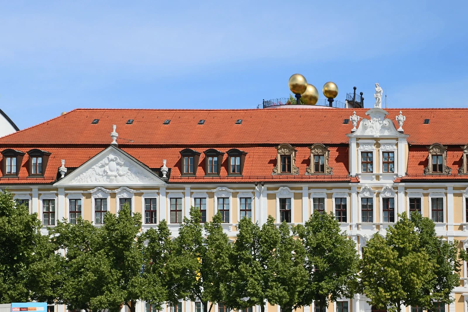 Exterior of the Landtag of Saxony-Anhalt building, with trees in the foreground.