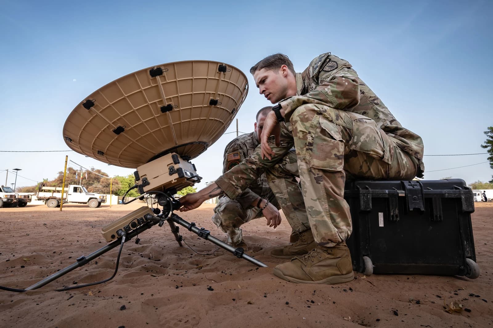 Soldiers from the 2nd Security Force Assistance Brigade assemble satellite communications equipment.