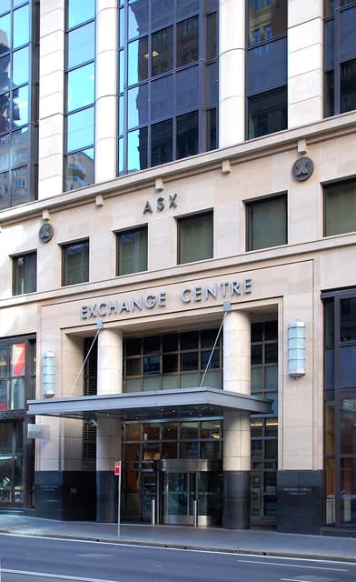 Entrance of the Sydney Exchange Centre building with 'ASX' and 'Exchange Centre' signs.