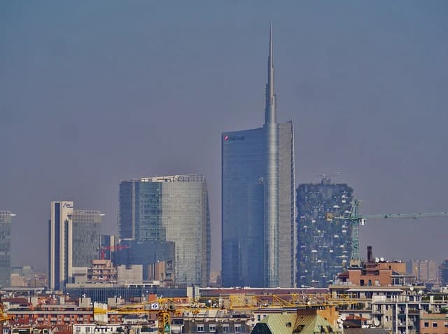 Milan cityscape with the tall Unicredit Tower and other modern buildings.