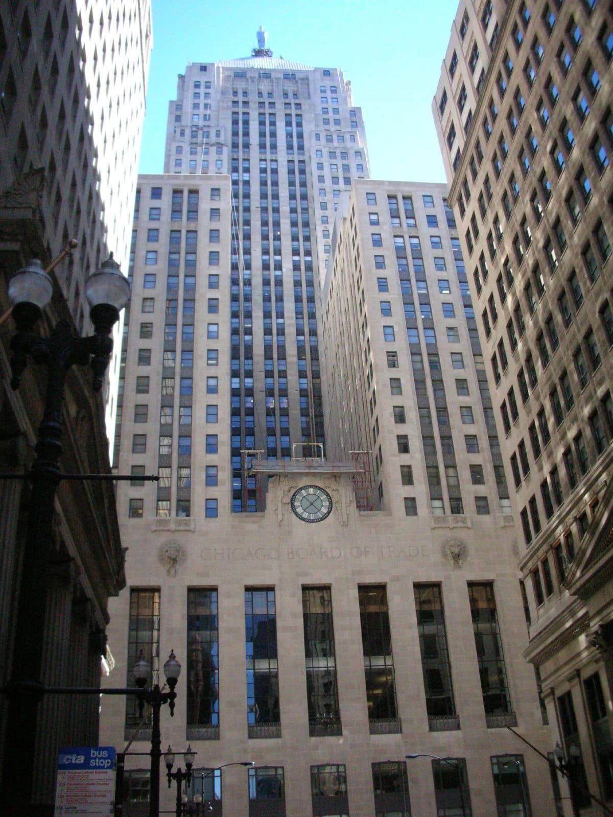 Exterior of the historic Chicago Board of Trade Building, a tall skyscraper with a clock.