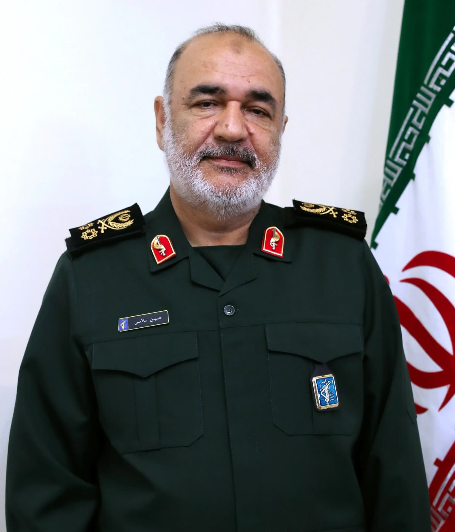 General Hossein Salami, commander-in-chief of the Islamic Revolutionary Guard Corps, standing indoors.