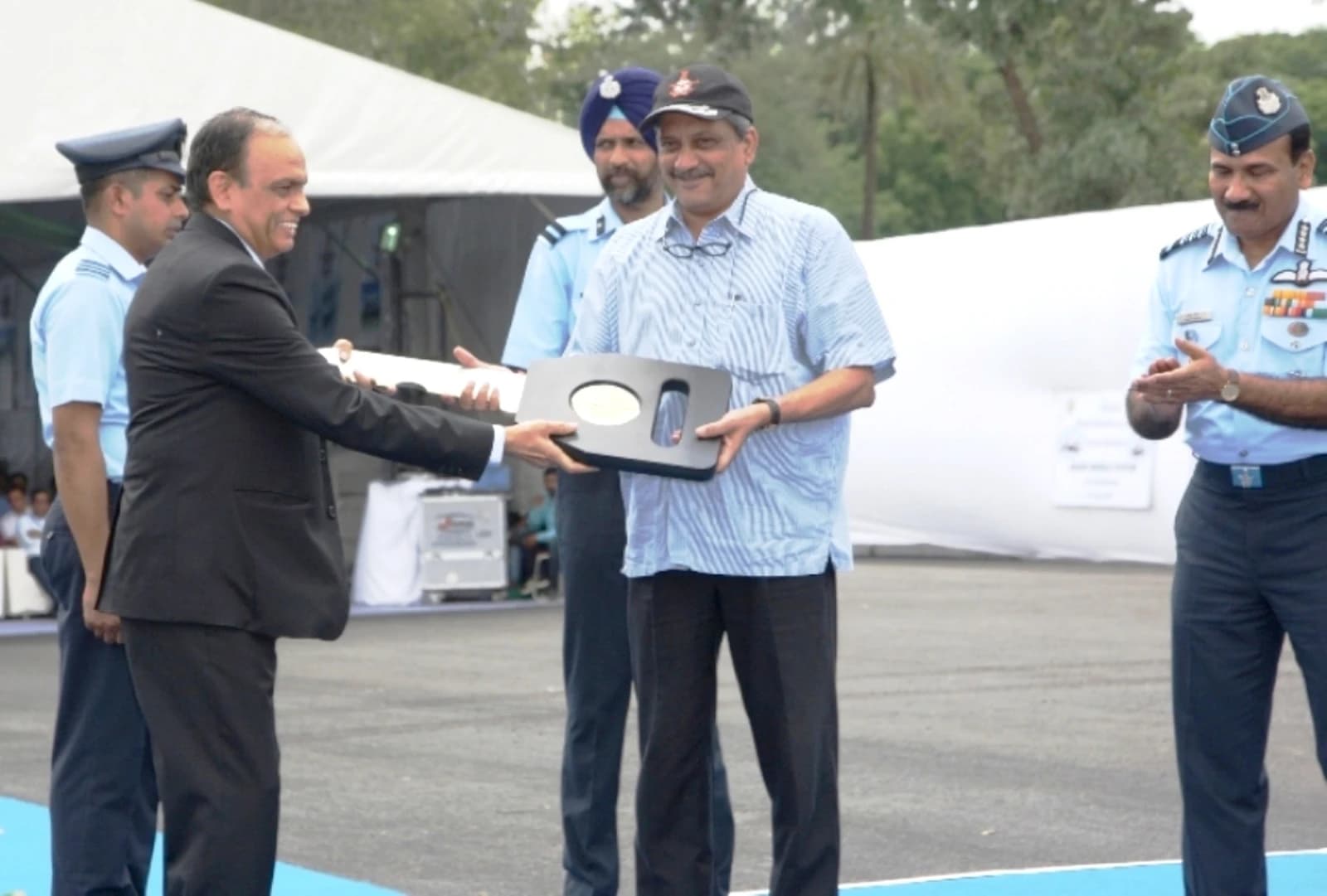 S.K. Sharma, CMD of BEL, hands over a notional key to Defence Minister Manohar Parrikar.