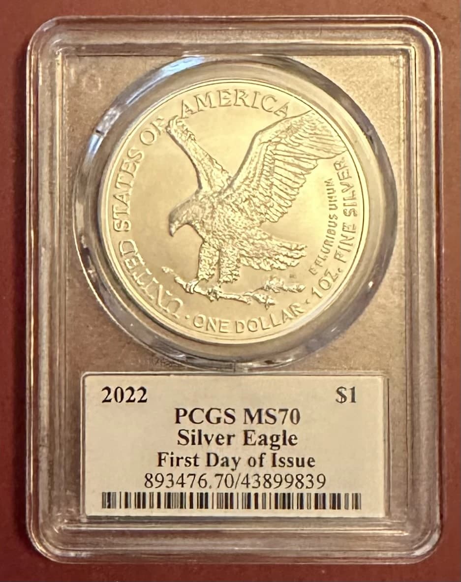 A close-up view of a 2022 American Silver Eagle coin, certified PCGS MS70.