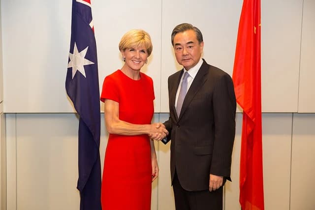 Australian Foreign Minister Julie Bishop shaking hands with Chinese Foreign Minister Wang Yi.