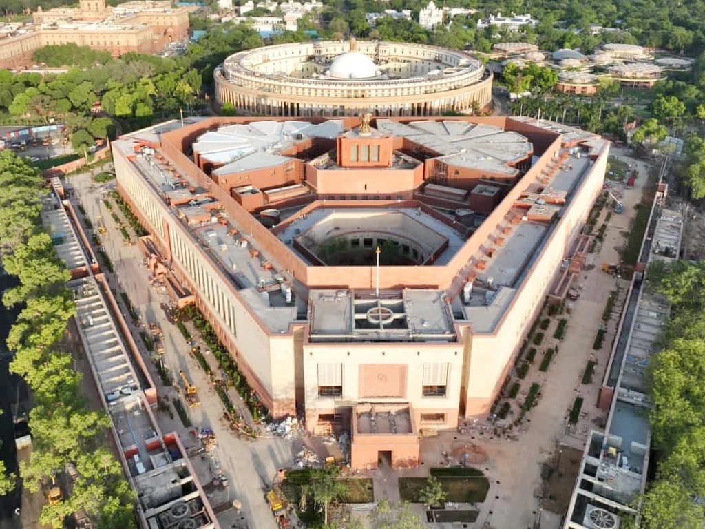 Aerial view of the new Parliament Building and the old Parliament building in New Delhi.