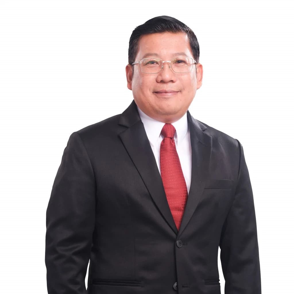 Arief Prasetyo Adi, Head of the National Food Agency, smiling and looking forward.