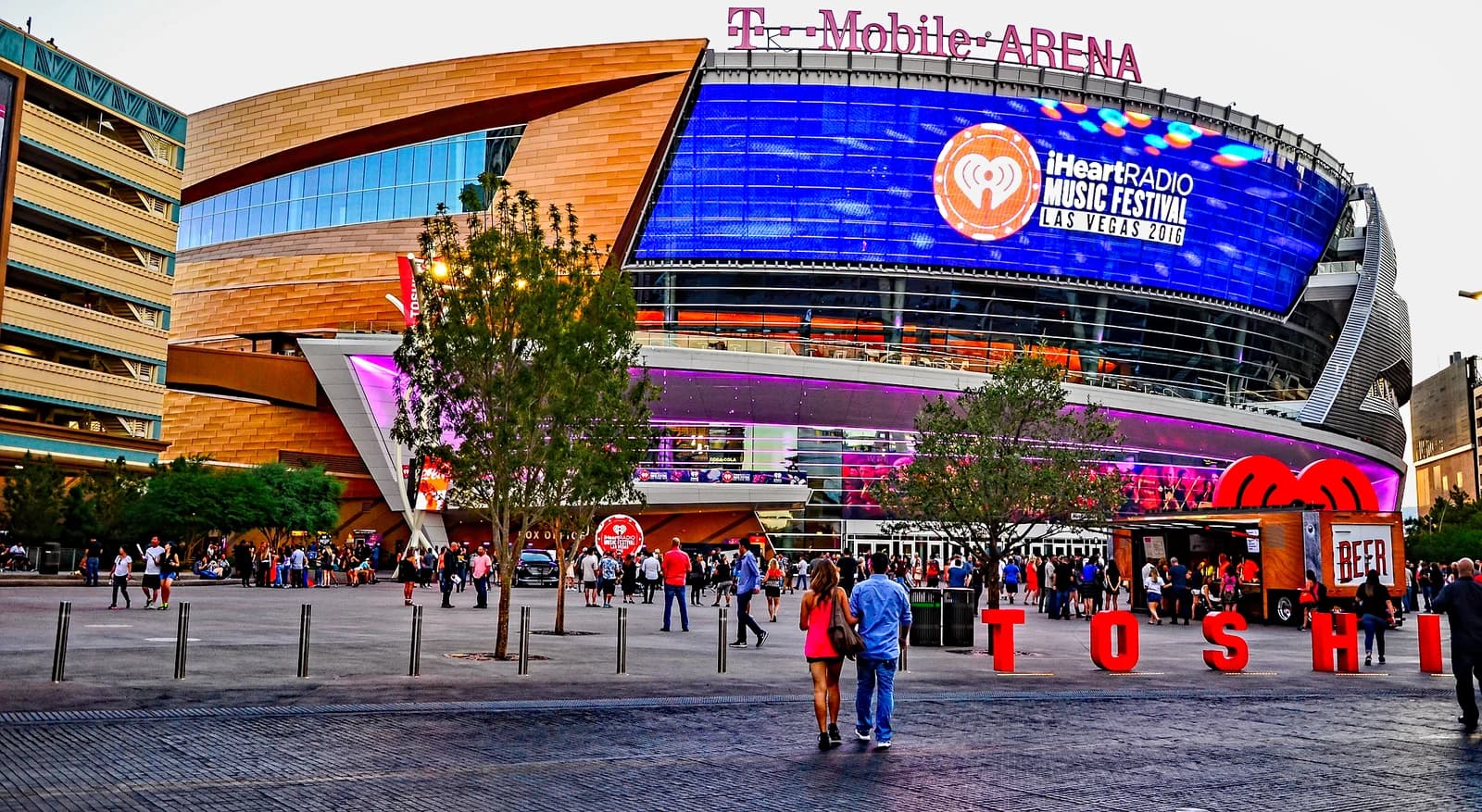 Exterior of T-Mobile Arena, a large building with a digital facade, on the Las Vegas Strip.
