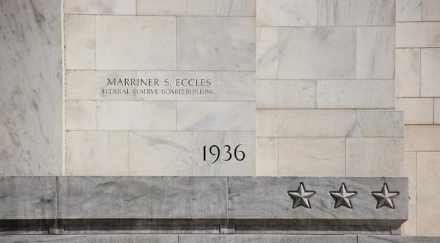 Cornerstone of the Marriner S. Eccles Federal Reserve Board Building with year 1936.