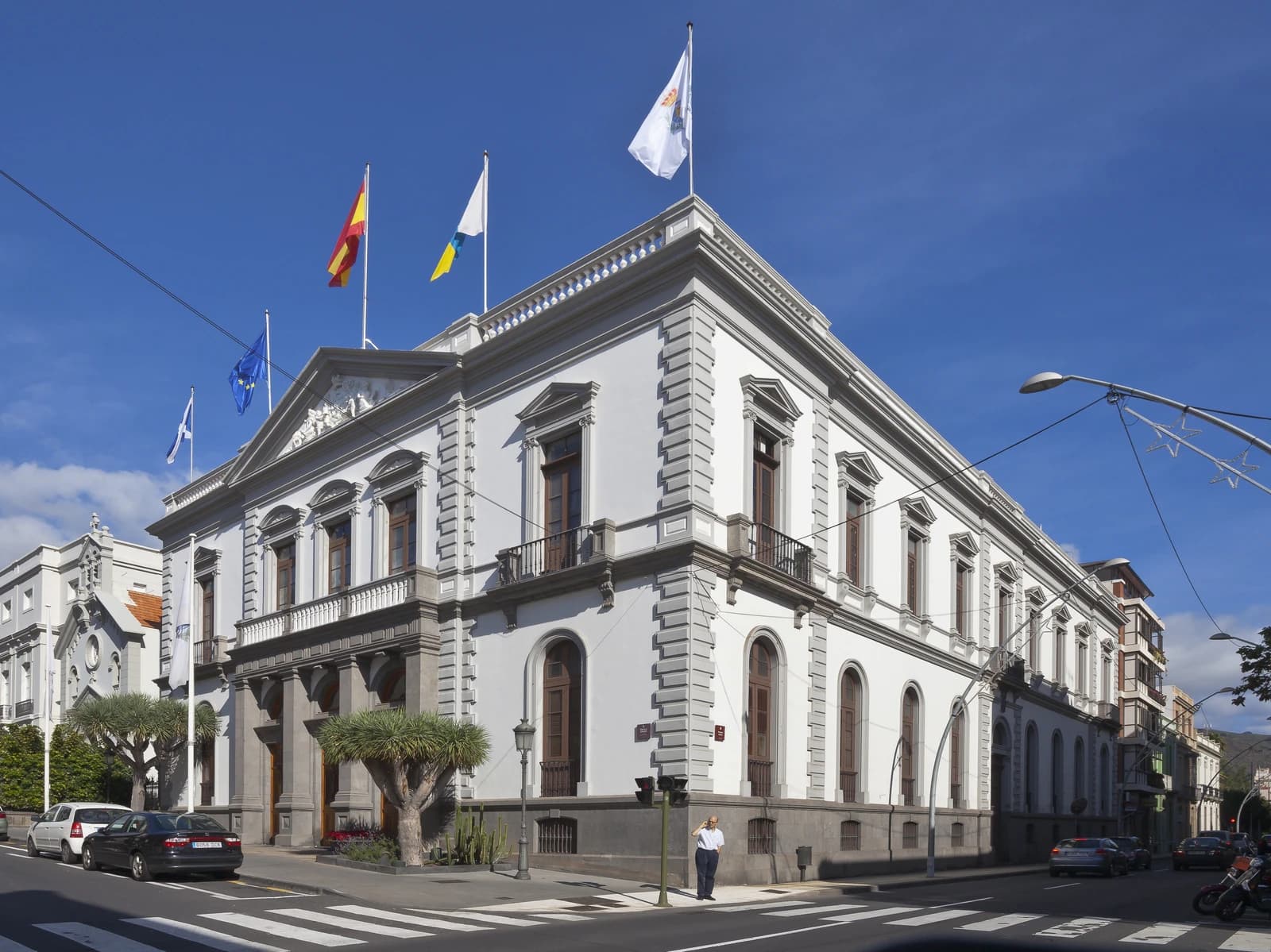 Exterior view of the Santa Cruz de Tenerife City Hall building on a sunny day.