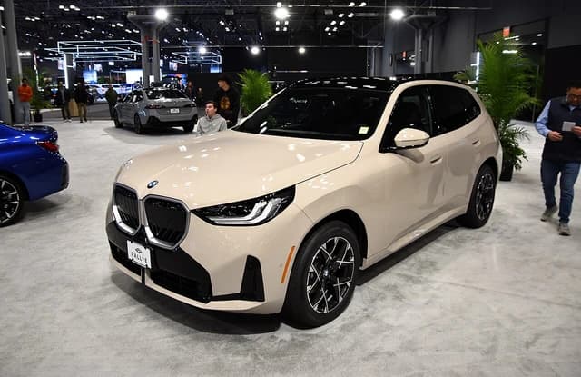 BMW X3 30 xDrive (G45) in a light color, on display at an auto show.