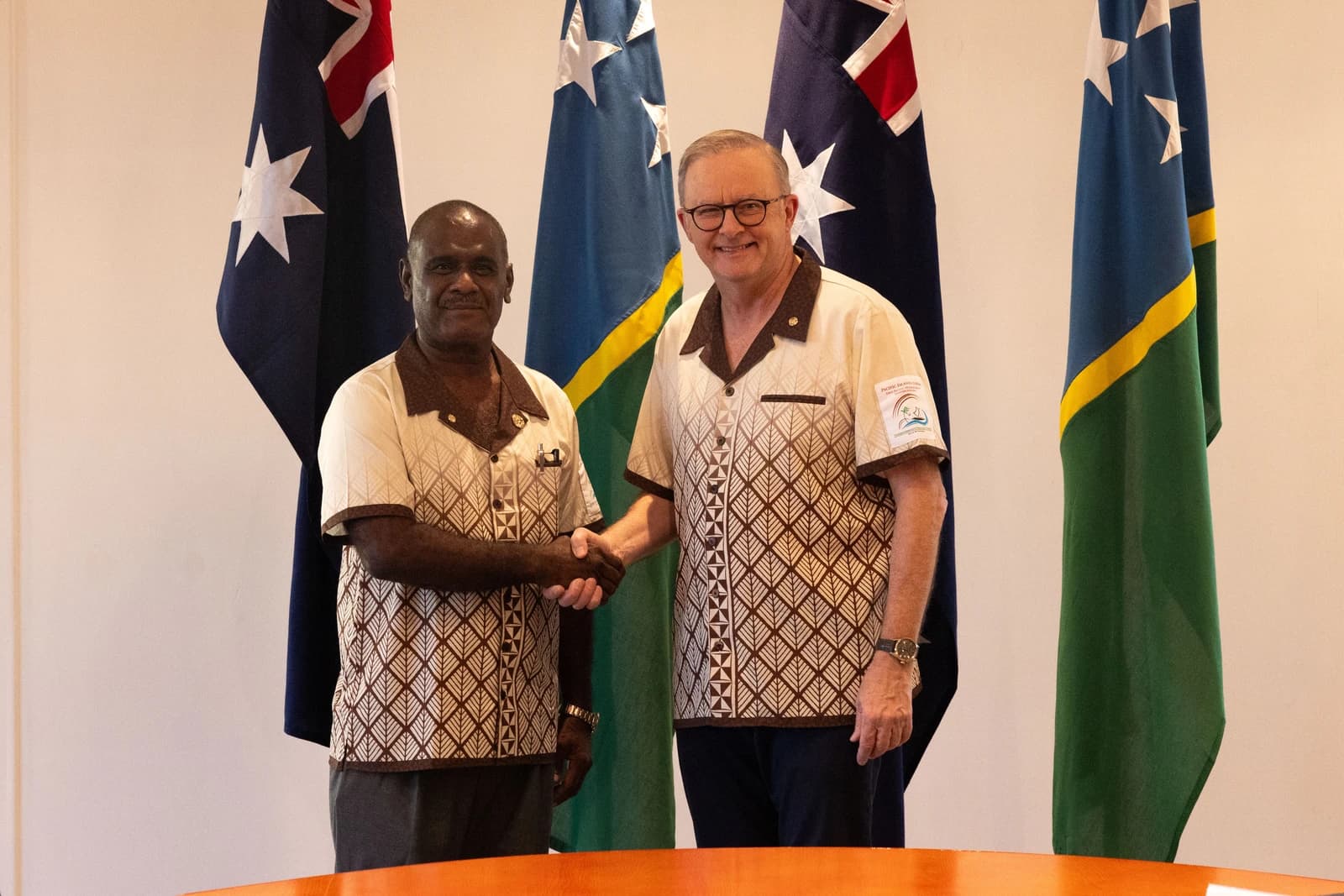 Anthony Albanese, Prime Minister of Australia, shaking hands with Manasseh Sogavare, Prime Minister of Solomon Islands.