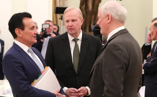 Pascal Soriot, AstraZeneca CEO, speaking with Robert Dudley and Roger Mannings.