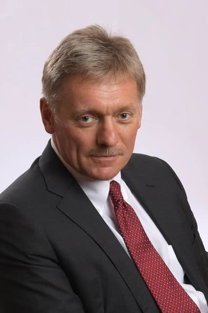 Dmitry Peskov, Russian presidential press secretary, looking directly at the camera.