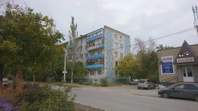 Apartment building with blue patterned facade on Gorky Street, Volgodonsk, Russia.