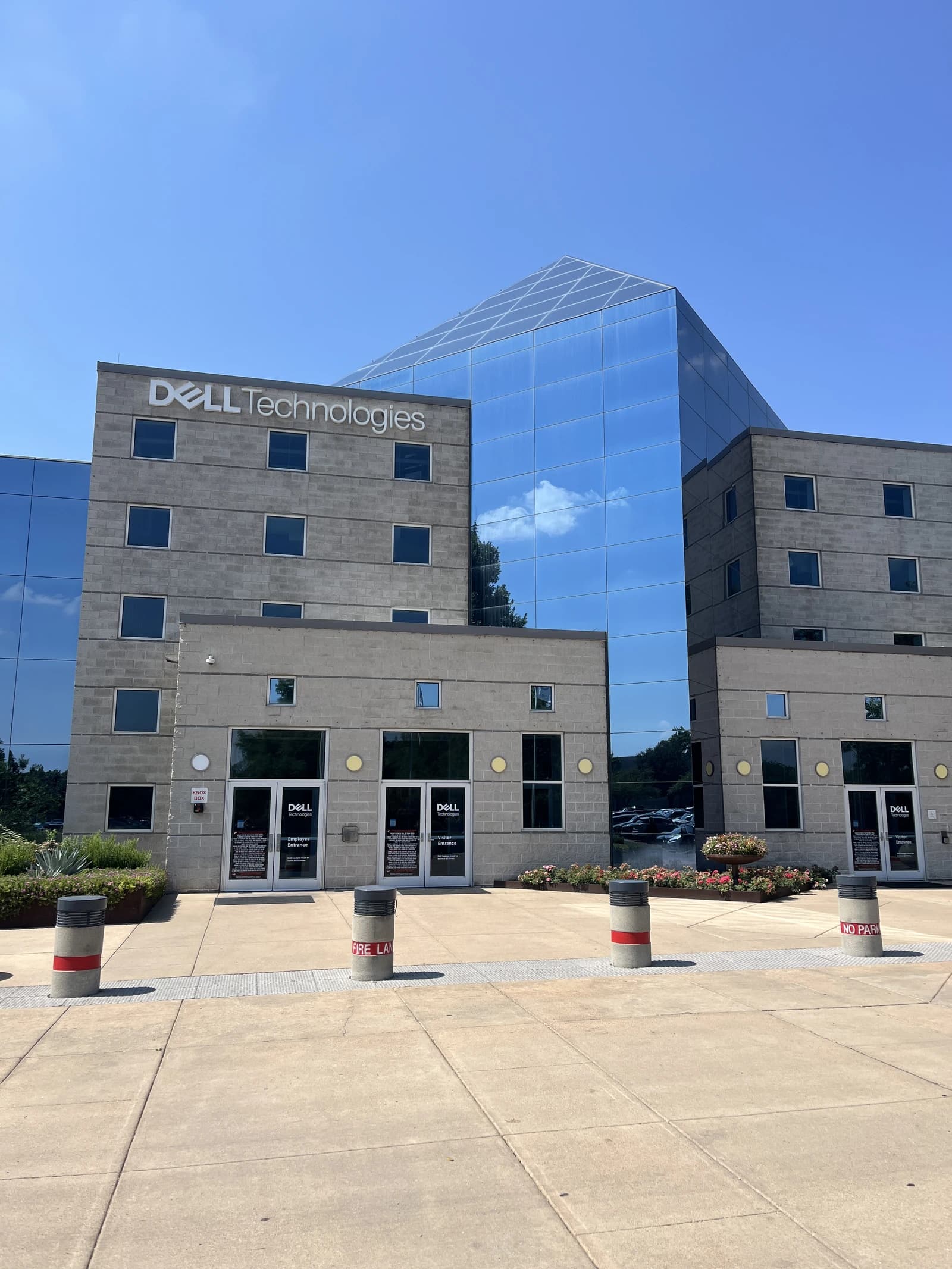 Exterior view of Dell Technologies Headquarters building on a sunny day.