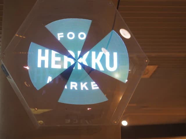 Food Market Herkku sign, a supermarket located in Helsinki, Finland.