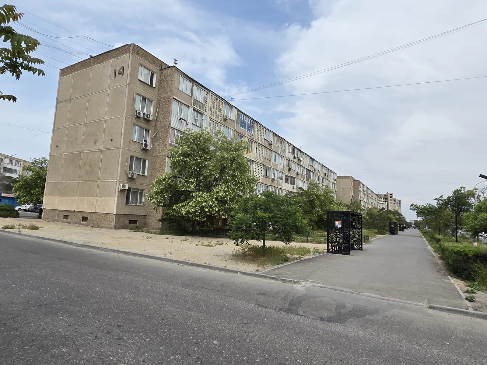 Residential apartment block in Aktau, Kazakhstan, featuring the city's unique address system.
