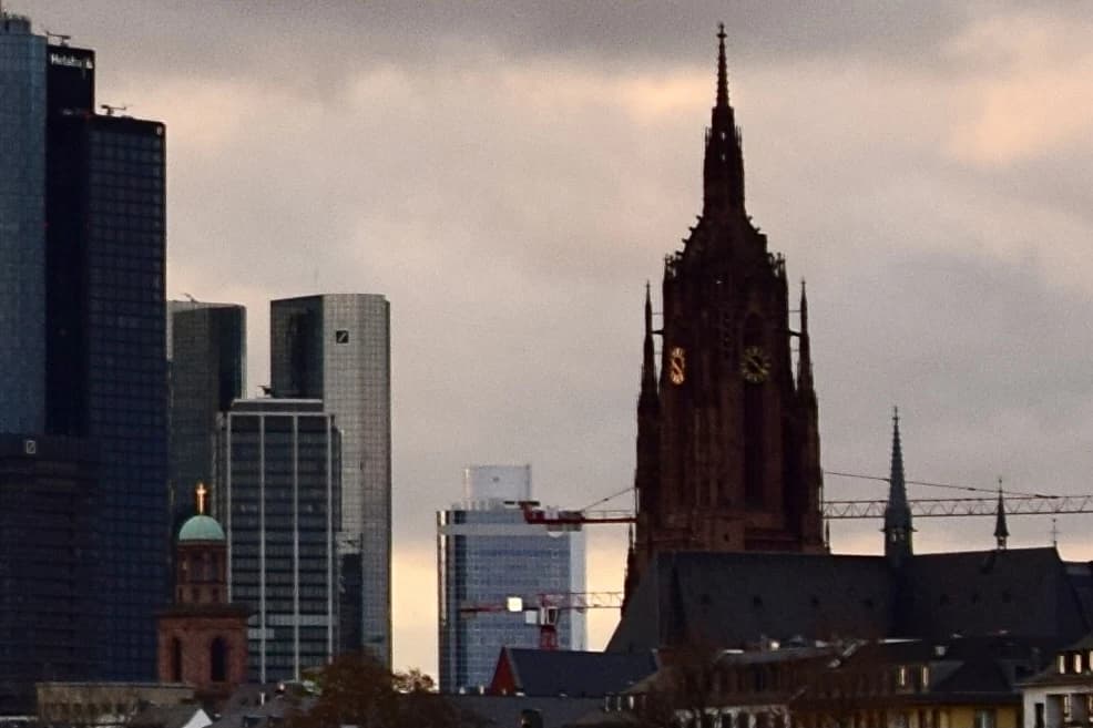 Deutsche Bank AG headquarters building and other Frankfurt architecture.