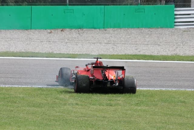 Sebastian Vettel in a red Ferrari Formula 1 car during the Italian Grand Prix.