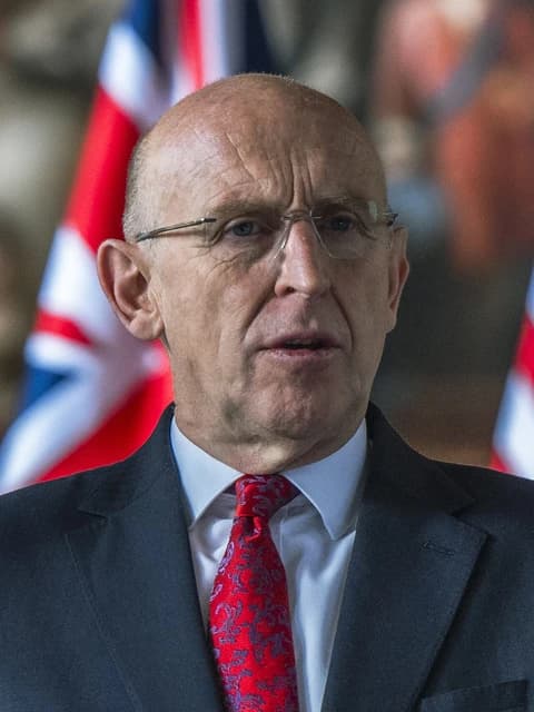 John Healey, UK Shadow Secretary of State for Defence, addressing an audience.
