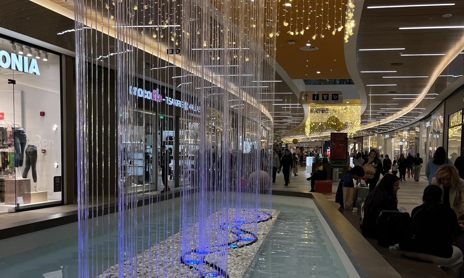 Shoppers inside Nicosia Mall, a large retail complex in Cyprus.