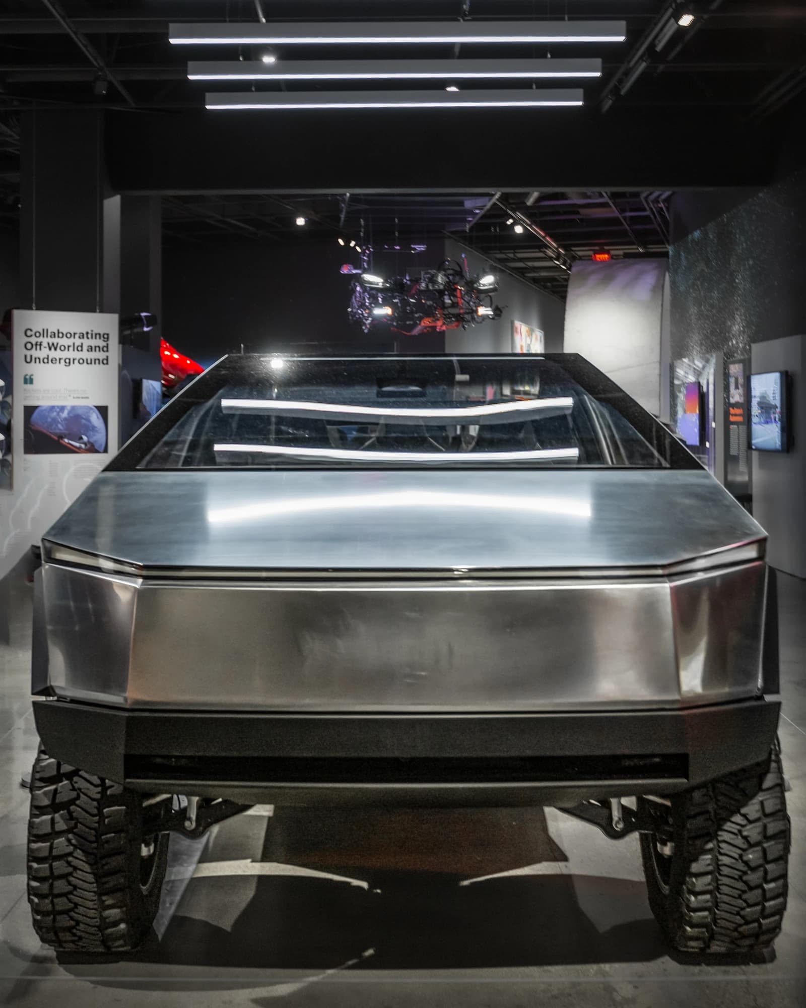 Tesla Cybertruck prototype displayed indoors from a frontal perspective.