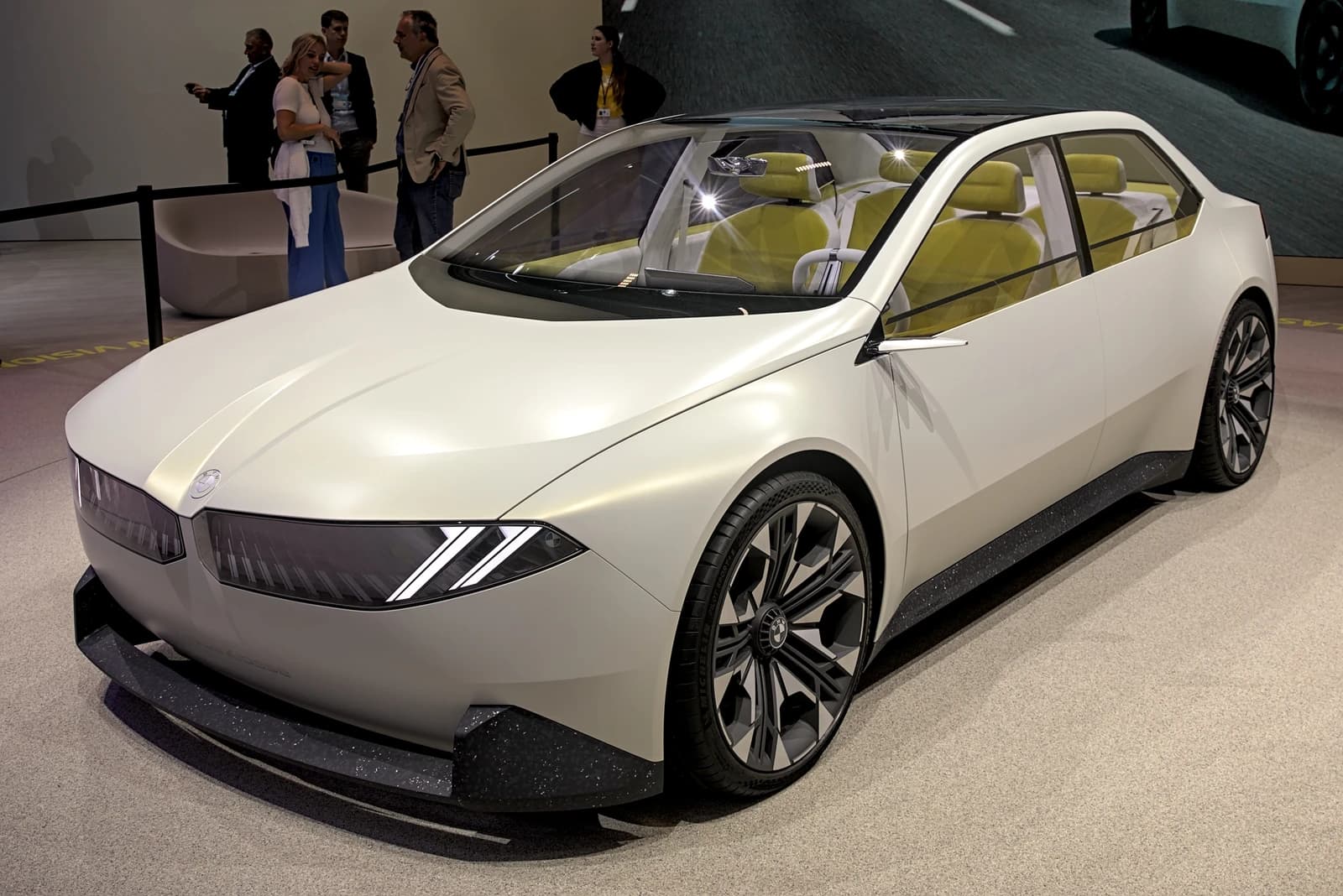BMW Vision Neue Klasse concept car, front three-quarter view, at an auto show.