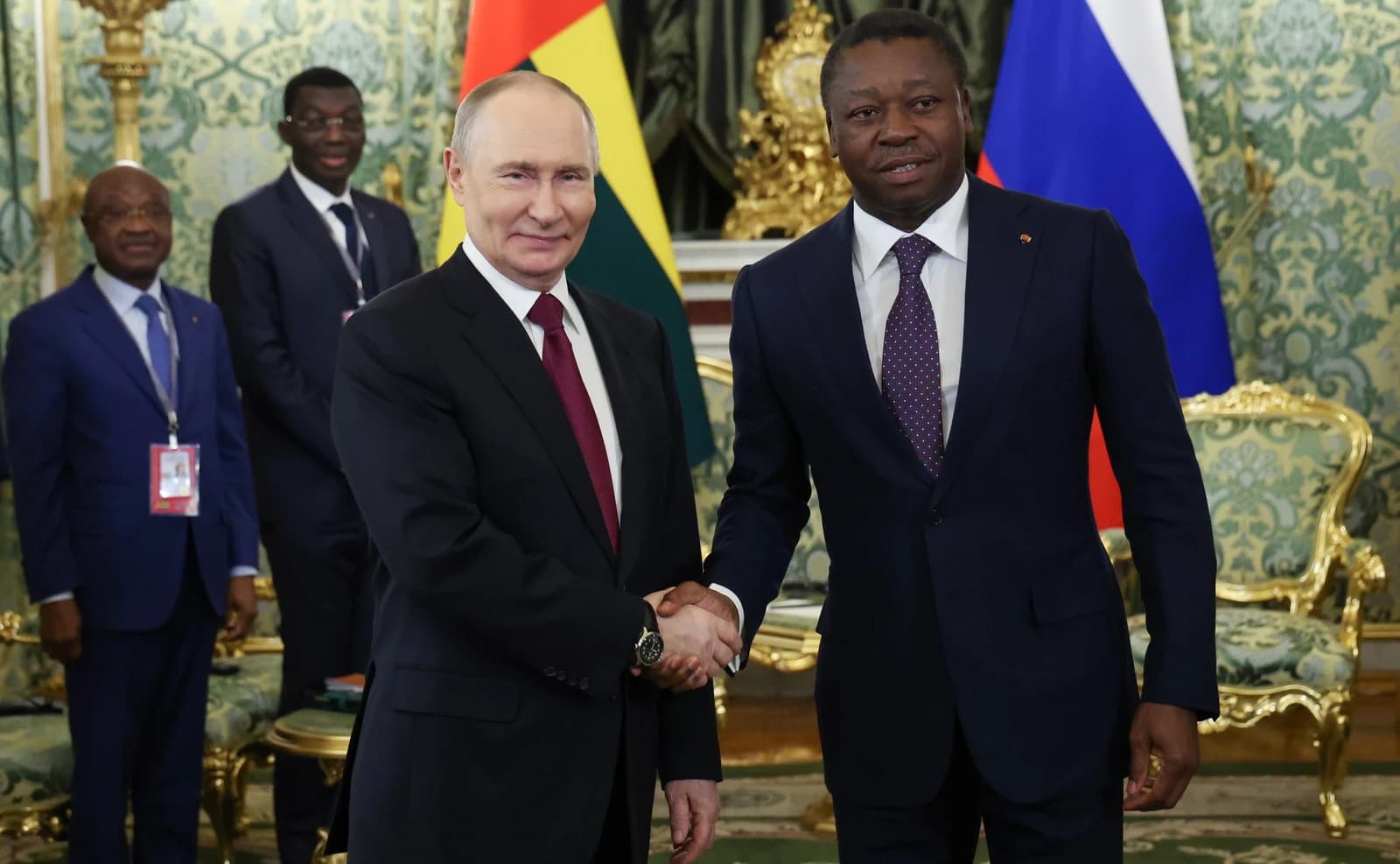 Vladimir Putin, President of Russia, shaking hands with Faure Gnassingbé, President of Togo.