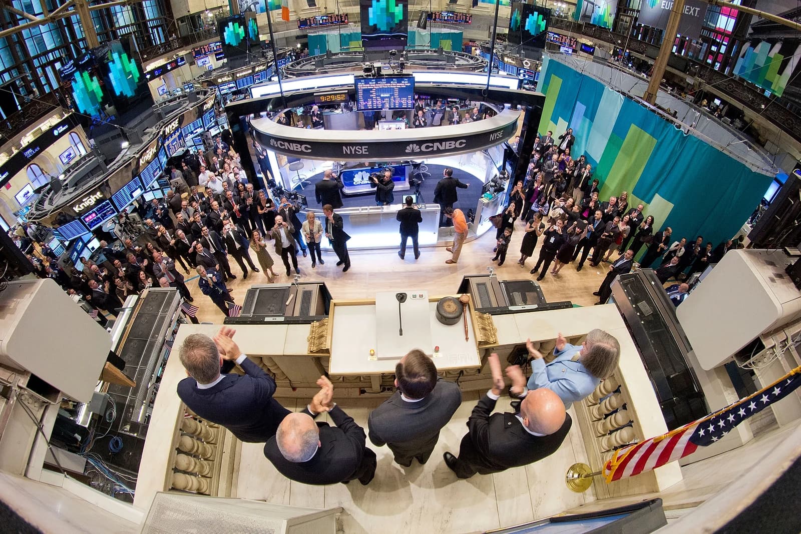 General David Petraeus rings the opening bell at the New York Stock Exchange.