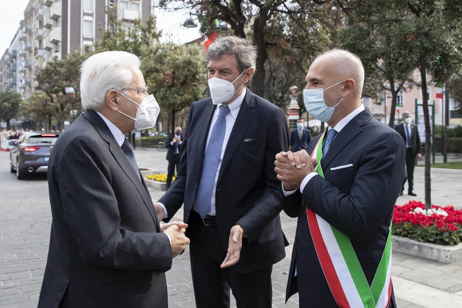 Sergio Mattarella, President of Italy, speaking with Marco Marsilio and Pierluigi Biondi.