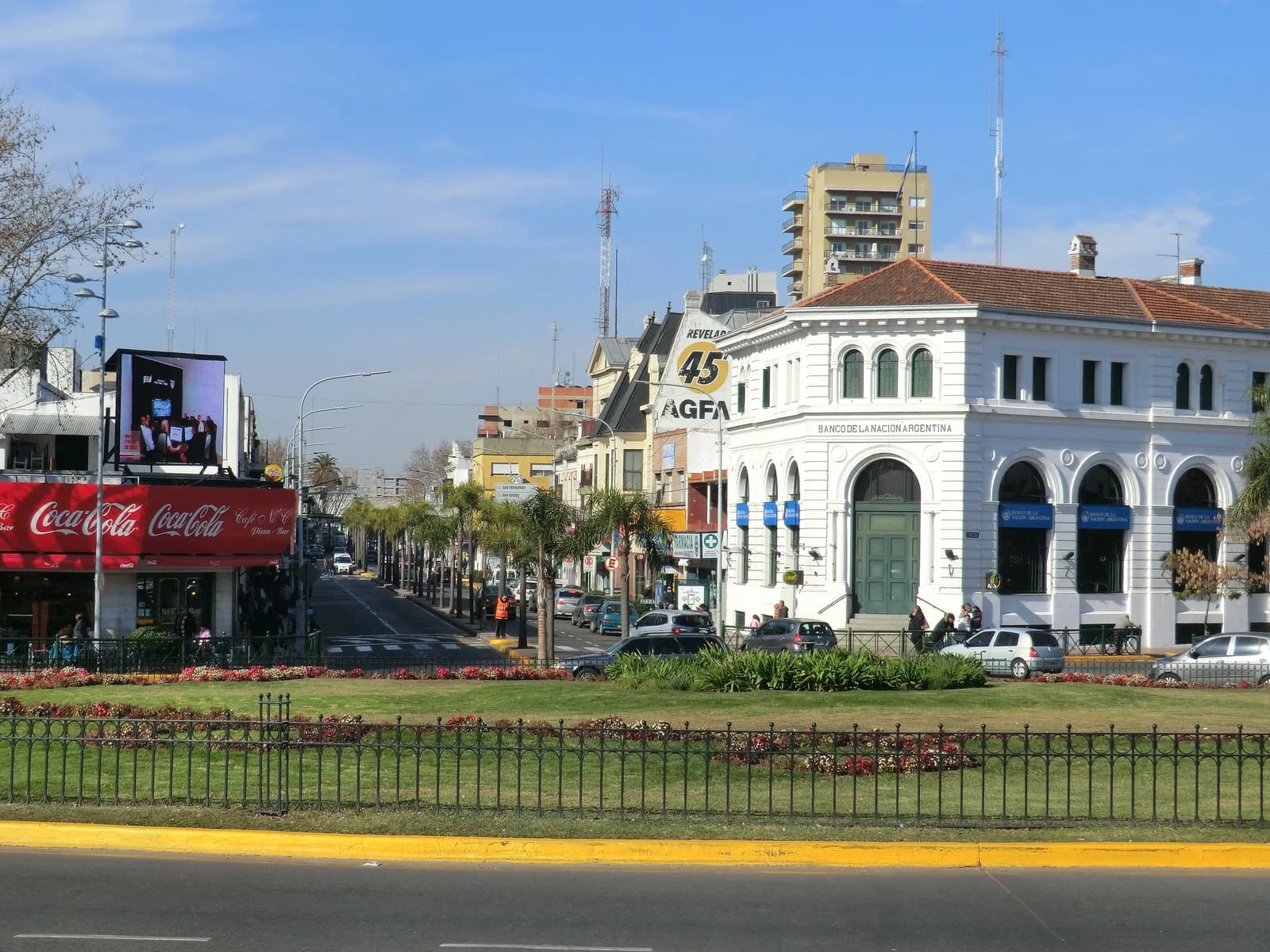 Banco de la Nación Argentina building on a tree-lined street in Tigre.