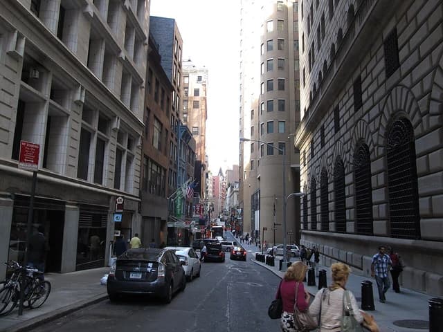 Looking up Nassau Street next to the Federal Reserve Bank of New York.