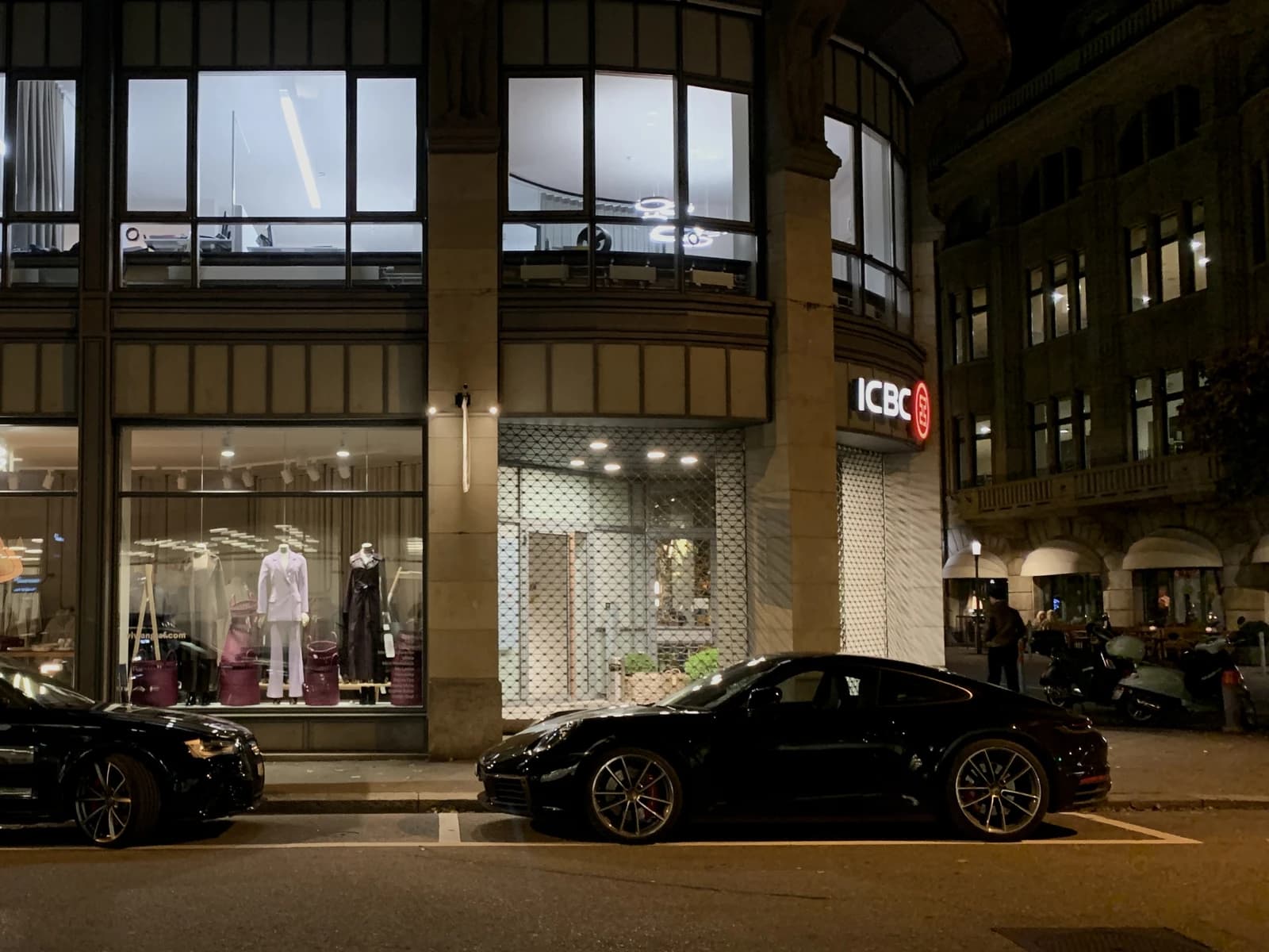 Exterior of Industrial and Commercial Bank of China (ICBC) Zurich branch at night.