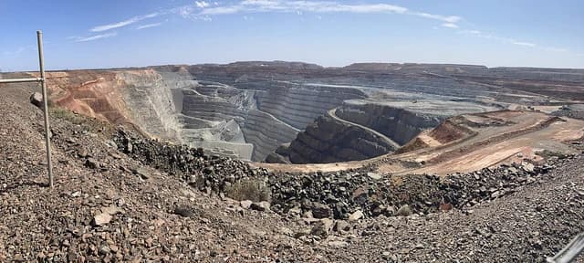 Kalgoorlie Super Pit, a large open-pit gold mine with tiered levels.