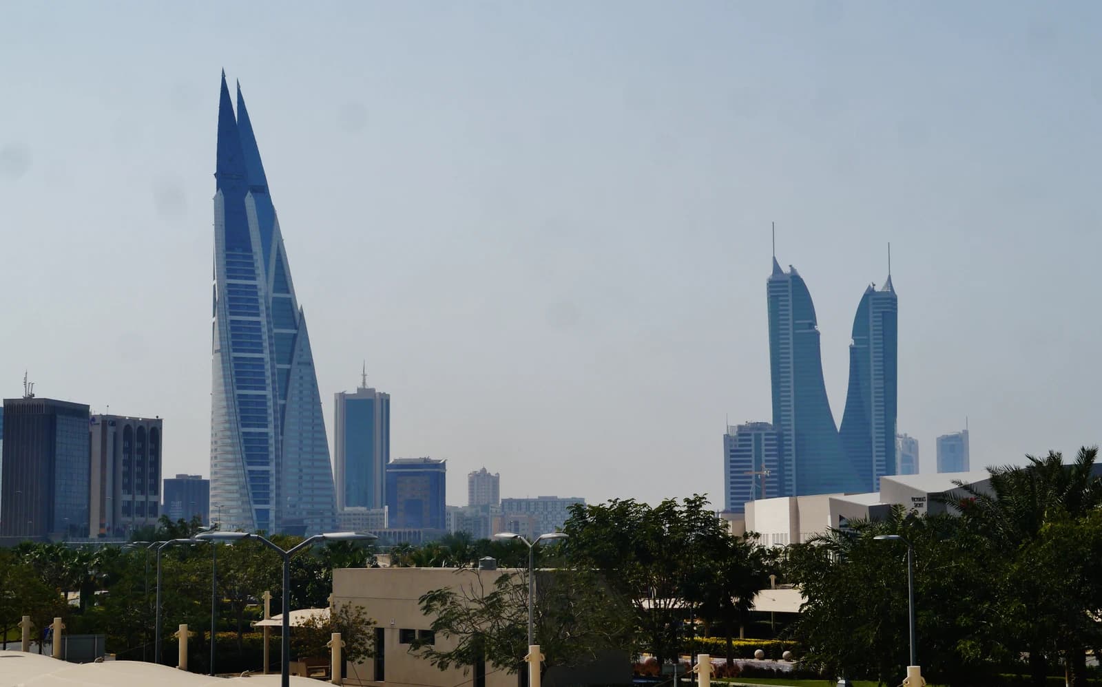 Manama skyline with Bahrain World Trade Centre and Bahrain Financial Harbour buildings.