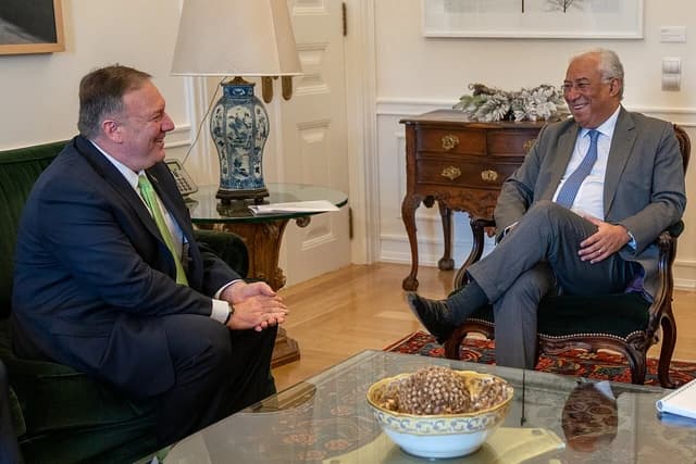 Secretary Mike Pompeo meets with Portuguese Prime Minister António Costa in an office.