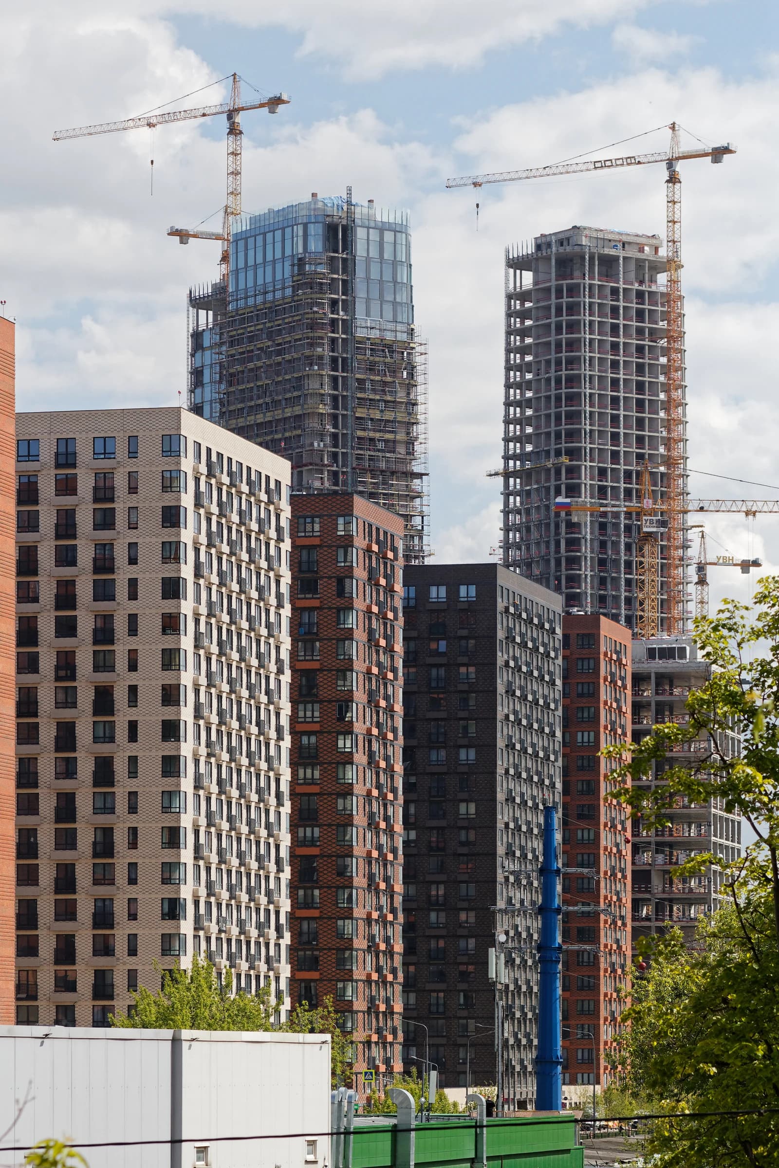 Apartment buildings and construction cranes in the Fili district of Moscow.