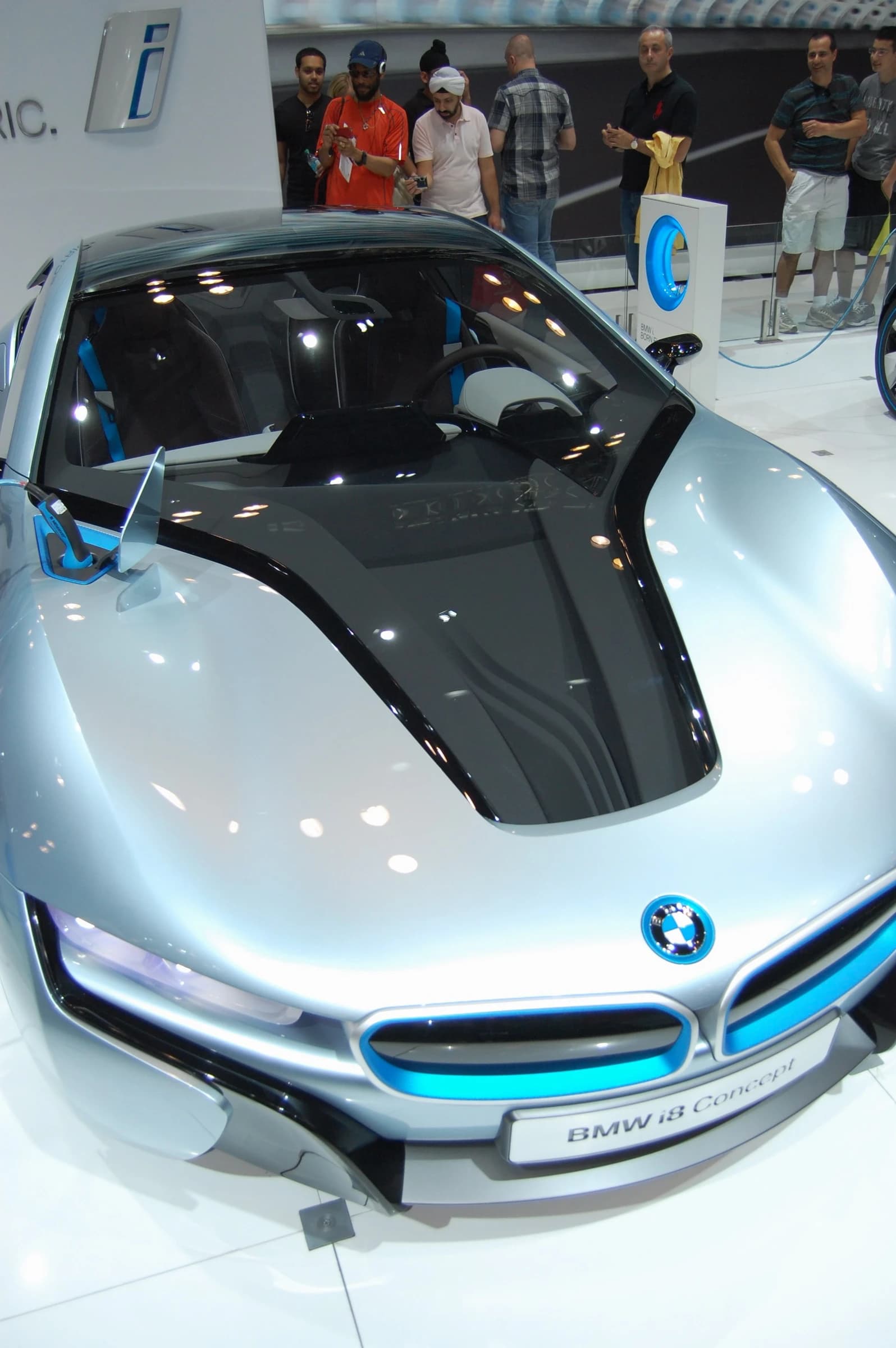 BMW i8 Concept car with a silver and black exterior on display.