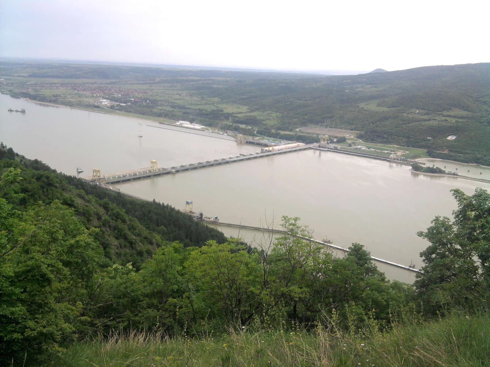 Aerial view of the Iron Gate I hydroelectric power station and the surrounding landscape.