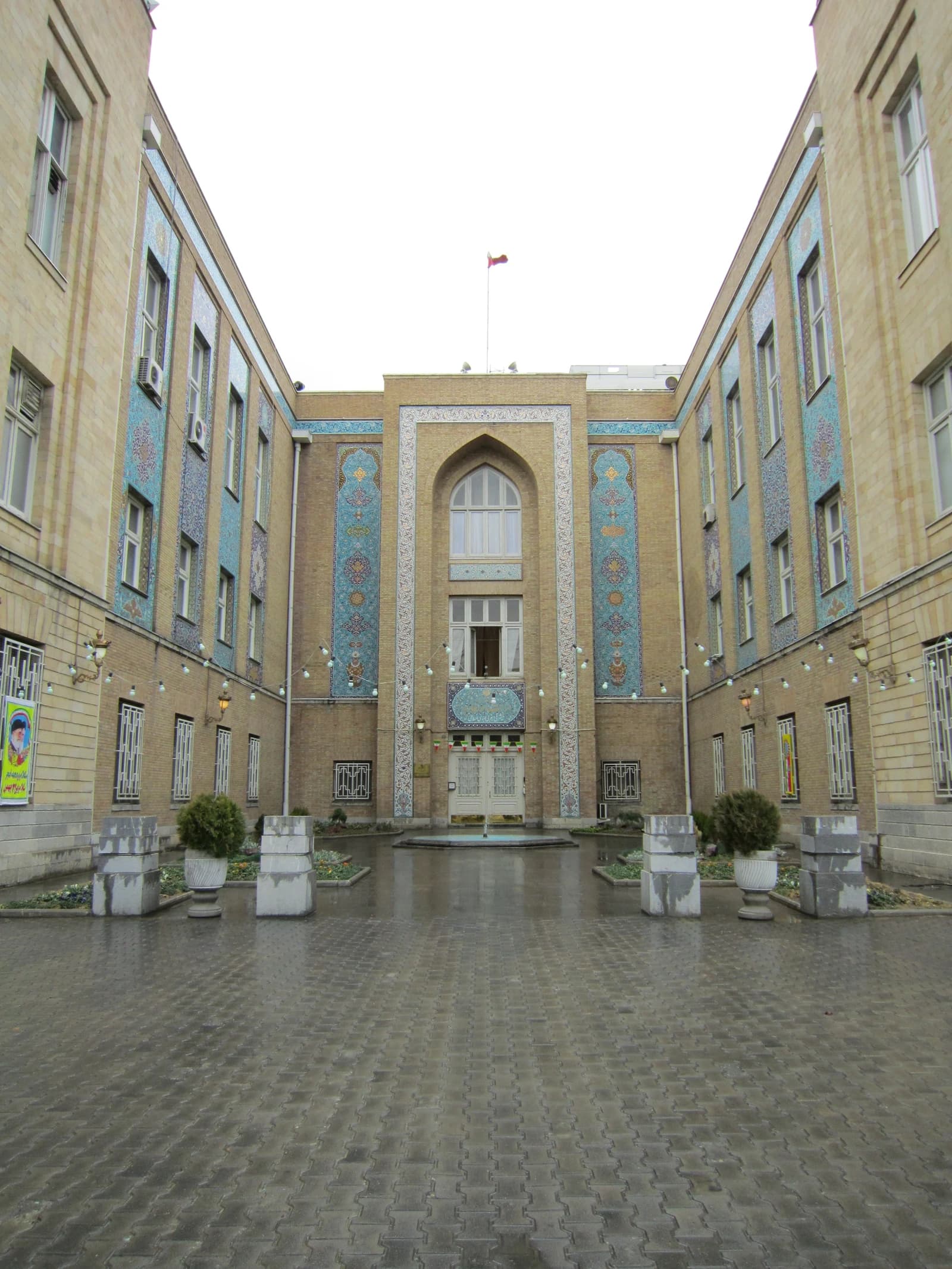 Exterior of the Ministry of Foreign Affairs building in Iran, featuring traditional architectural elements.
